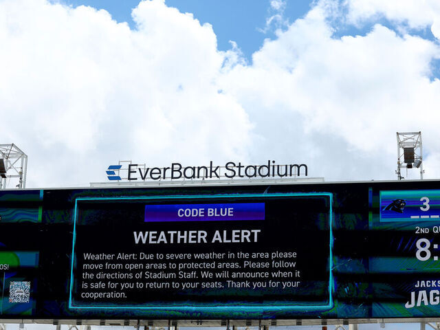 JACKSONVILLE, FLORIDA - SEPTEMBER 07: A weather alert is displayed after lighting delayed the game between the Carolina Panthers and the Jacksonville Jaguars during the second quarter at EverBank Stadium on September 07, 2025 in Jacksonville, Florida.