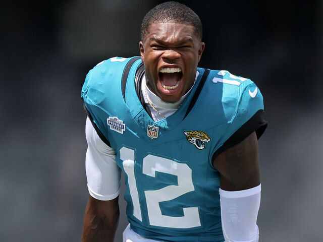 JACKSONVILLE, FLORIDA - SEPTEMBER 07: Travis Hunter #12 of the Jacksonville Jaguars reacts as he takes the field prior to a game against the Carolina Panthers during the game at EverBank Stadium on September 07, 2025 in Jacksonville, Florida.