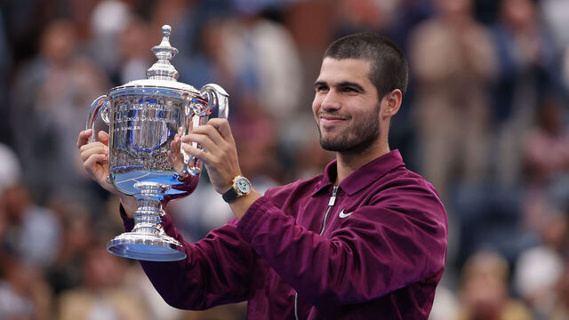 NEW YORK, NEW YORK - SEPTEMBER 07: Carlos Alcaraz of Spain poses with his trophy after defeating Jannik Sinner of Italy during their Men's Singles Final match on Day Fifteen of the 2025 US Open at USTA Billie Jean King National Tennis Center on September 07, 2025 in New York City.
