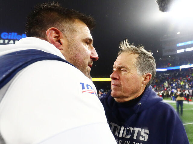 FOXBOROUGH, MASSACHUSETTS - JANUARY 04: Head coach Mike Vrabel of the Tennessee Titans is congratulated by head coach Bill Belichick of the New England Patriots after their 20-13 win in the AFC Wild Card Playoff game at Gillette Stadium on January 04, 2020 in Foxborough, Massachusetts.