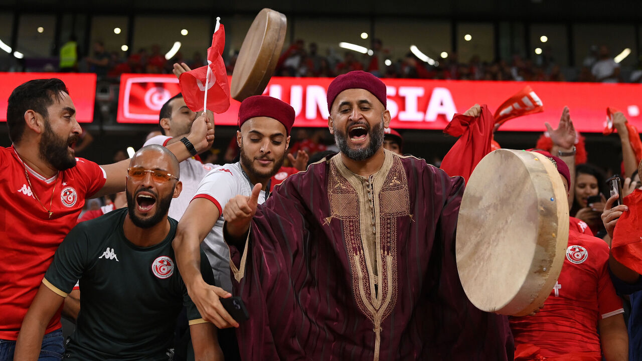AL RAYYAN, QATAR - NOVEMBER 30: A Tunisia fan with a drum and traditional dress shows his support during the FIFA World Cup Qatar 2022 Group D match between Tunisia and France at Education City Stadium on November 30, 2022 in Al Rayyan, Qatar.