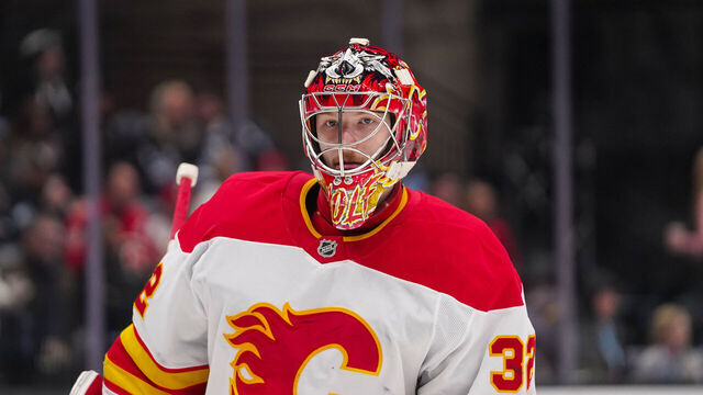 SALT LAKE CITY, UT - APRIL 01: Calgary Flames goalie Dustin Wolf (32) as seen during an NHL game between the Calgary Flames and The Utah Hockey Club on April 1, 2025 at the Delta Center in Salt Lake City, UT.
