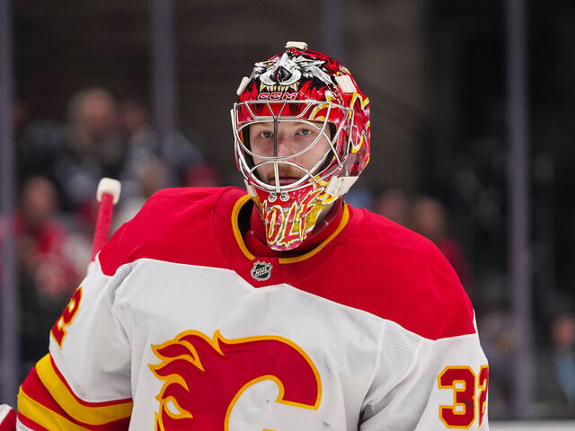 SALT LAKE CITY, UT - APRIL 01: Calgary Flames goalie Dustin Wolf (32) as seen during an NHL game between the Calgary Flames and The Utah Hockey Club on April 1, 2025 at the Delta Center in Salt Lake City, UT.