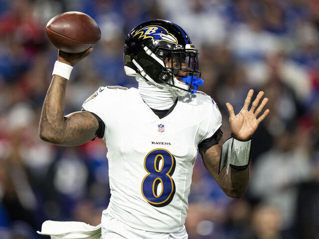 ORCHARD PARK, NEW YORK - SEPTEMBER 7: Lamar Jackson #8 of the Baltimore Ravens looks to pass during an NFL football game against the Buffalo Bills at Highmark Stadium on September 07, 2025 in Orchard Park, New York.