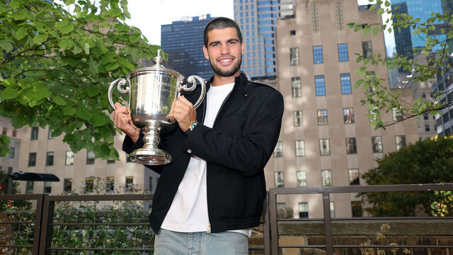 NEW YORK, NEW YORK - SEPTEMBER 08: US Open 2025 Champion Carlos Alcaraz of Spain poses for a photo overlooking the Rockefeller Plaza with the Men's Singles trophy following his victory over Jannik Sinner of Italy in the Men's Singles Final on September 08, 2025 in New York City.