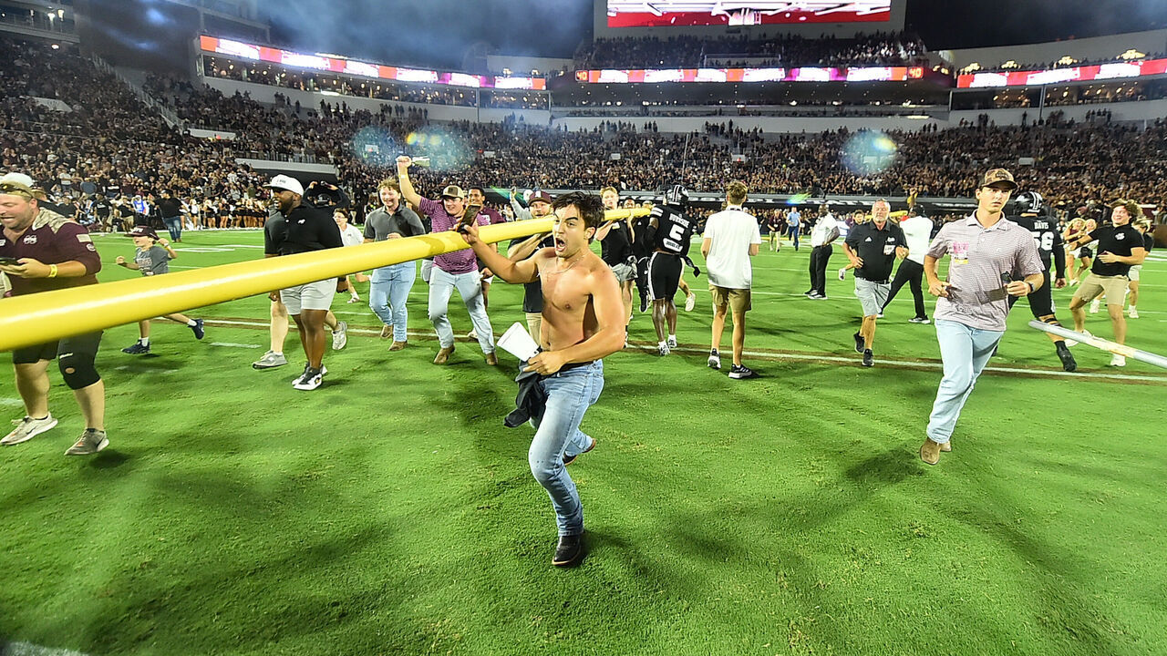 STARKVILLE, MISSISSIPPI - SEPTEMBER 06: Fans carry a goal post after the Mississippi State Bulldogs defeat the Arizona State Sun Devils at Davis Wade Stadium on September 06, 2025 in Starkville, Mississippi.