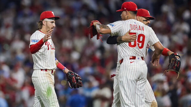PHILADELPHIA, PA - SEPTEMBER 08: Jhoan Duran #59 and Bryson Stott #5 of the Philadelphia Phillies celebrate after the game between the New York Mets and the Philadelphia Phillies at Citizens Bank Park on Monday, September 8, 2025 in Philadelphia, Pennsylvania.