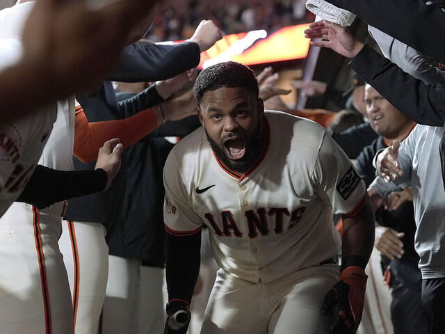 SAN FRANCISCO, CALIFORNIA - SEPTEMBER 08: Heliot Ramos #17 of the San Francisco Giants is congratulated by teammates after he hit a two-run home run against the Arizona Diamondbacks in the bottom of the six inning at Oracle Park on September 08, 2025 in San Francisco, California.