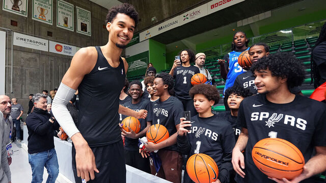 PARIS, FRANCE - JANUARY 20: Victor Wembanyama #1 of the San Antonio Spurs is greeted by young fans during practice as part of NBA Paris Games 2025 on January 20, 2025 at Nanterre 92 Sports Palace in Paris, France. NOTE TO USER: User expressly acknowledges and agrees that, by downloading and/or using this Photograph, user is consenting to the terms and conditions of the Getty Images License Agreement. Mandatory Copyright Notice: Copyright 2025 NBAE