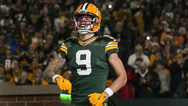 GREEN BAY, WISCONSIN - DECEMBER 23: Wide receiver Christian Watson #9 of the Green Bay Packers enters the field during player introductions prior to an NFL football game against the New Orleans Saints, at Lambeau Field on December 23, 2024 in Green Bay, Wisconsin.