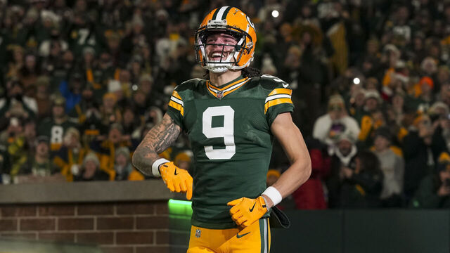 GREEN BAY, WISCONSIN - DECEMBER 23: Wide receiver Christian Watson #9 of the Green Bay Packers enters the field during player introductions prior to an NFL football game against the New Orleans Saints, at Lambeau Field on December 23, 2024 in Green Bay, Wisconsin.