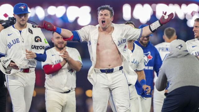 TORONTO, CANADA - SEPTEMBER 9: Tyler Heineman #55 of the Toronto Blue Jays celebrates after hitting a walk off single against the Houston Astros during the tenth inning in their MLB game at Rogers Centre on September 9, 2025 in Toronto, Canada.