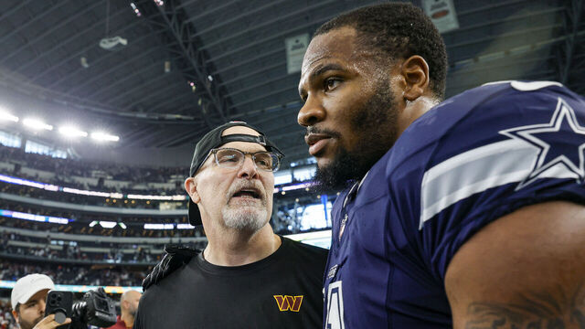 ARLINGTON, TX - JANUARY 05: Dallas Cowboys linebacker Micah Parsons (11) and Washington Commanders Head Coach Dan Quinn talk after the game between the Dallas Cowboys and the Washington Commanders on January 5, 2025 at AT&T Stadium in Arlington, Texas.