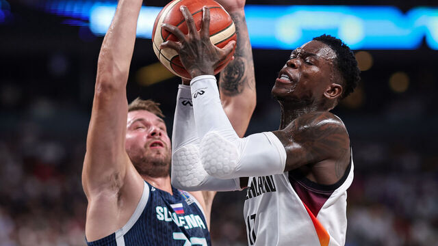RIGA, LATVIA - SEPTEMBER 10: Dennis Schröder of Germany, Luka Doncic of Slovenia during the FIBA EuroBasket 2025 quarterfinal between Germany and Slovenia at Arena Riga on September 10, 2025 in Riga, Latvia.