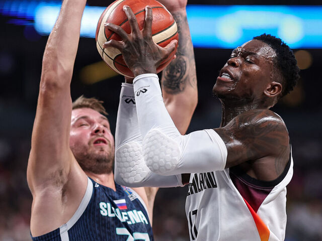 RIGA, LATVIA - SEPTEMBER 10: Dennis Schröder of Germany, Luka Doncic of Slovenia during the FIBA EuroBasket 2025 quarterfinal between Germany and Slovenia at Arena Riga on September 10, 2025 in Riga, Latvia.