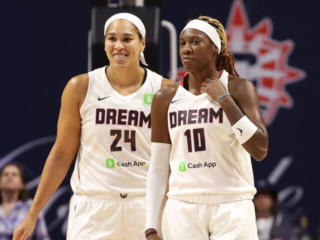 UNCASVILLE, CT - SEPTEMBER 10: Brionna Jones #24 and Rhyne Howard #10 of the Atlanta Dream smiles during the game against the Connecticut Sun on September 10, 2025 at the Mohegan Sun Arena in Uncasville, Connecticut. Mandatory Copyright Notice: Copyright 2025 NBAE