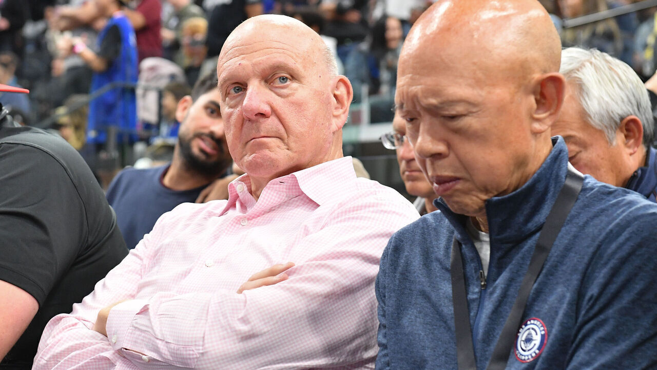 LOS ANGELES, CALIFORNIA - NOVEMBER 02: Steve Ballmer and Dennis Wong (R) attend a basketball game between the LA Clippers and the Oklahoma City Thunder at Crypto.com Arena on November 02, 2024 in Los Angeles, California.
