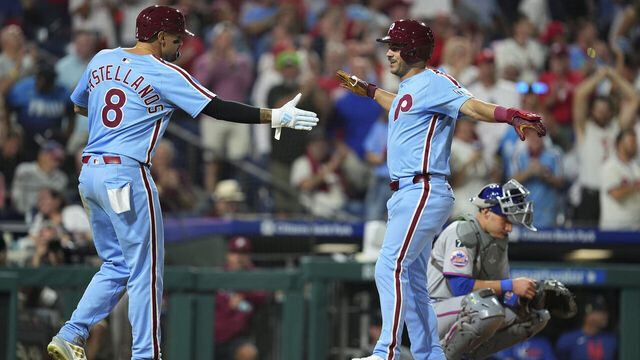 PHILADELPHIA, PENNSYLVANIA - SEPTEMBER 11: Otto Kemp #4 of the Philadelphia Phillies celebrates with Nick Castellanos #8 after hitting a two run home run in the bottom of the fourth inning against the New York Mets at Citizens Bank Park on September 11, 2025 in Philadelphia, Pennsylvania. The Phillies defeated the Mets 6-4.