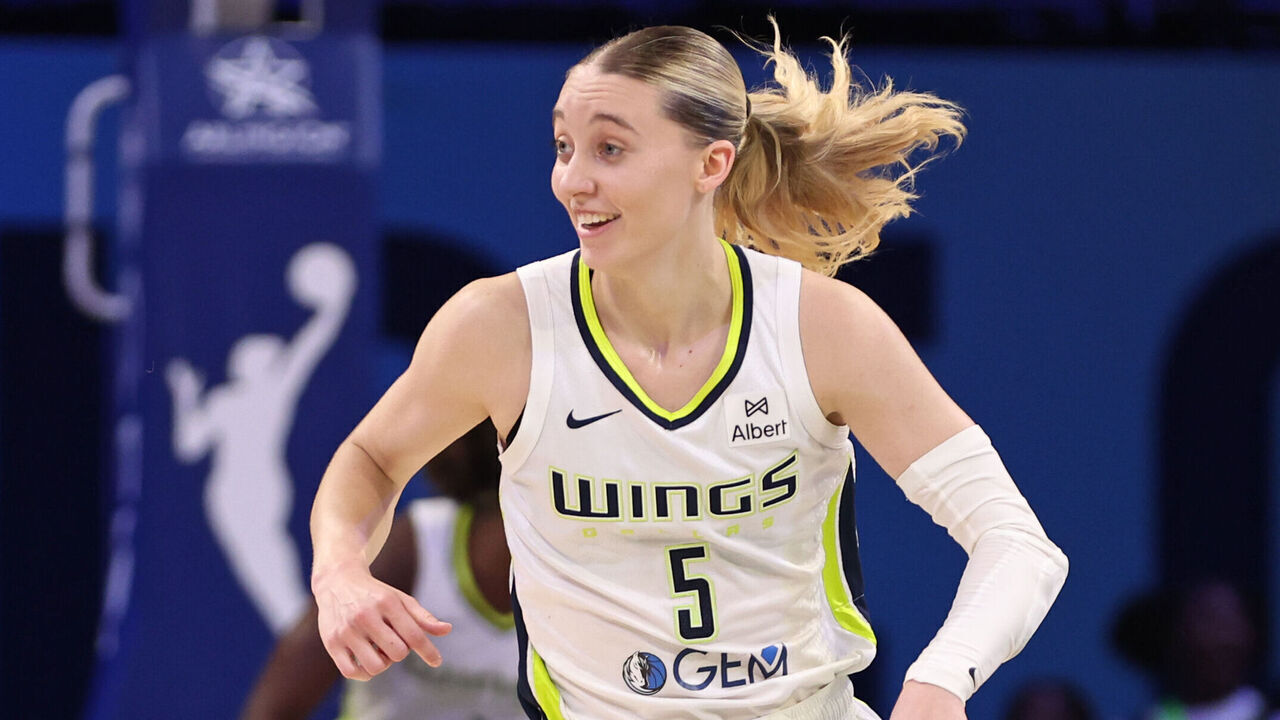 ARLINGTON, TX - SEPTEMBER 11: Paige Bueckers #5 of the Dallas Wings smiles during the game against the Phoenix Mercury on September 11, 2025 at the College Park Center in Arlington, TX. Mandatory Copyright Notice: Copyright 2025 NBAE