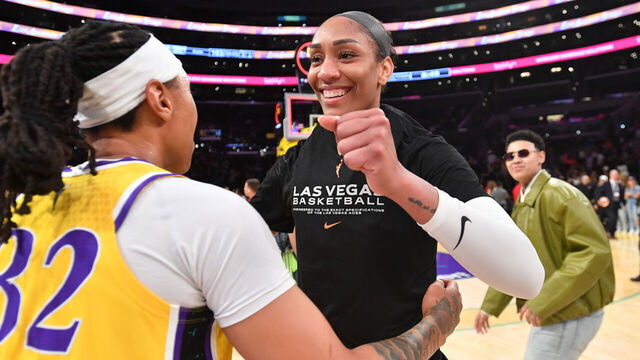 LOS ANGELES, CA - SEPTEMBER 11: A'ja Wilson #22 of the Las Vegas Aces and Emma Cannon #32 of the Los Angeles Sparks hugs after the game on September 11, 2025 at Crypto.Com Arena in Los Angeles, California. NOTE TO USER: User expressly acknowledges and agrees that, by downloading and/or using this Photograph, user is consenting to the terms and conditions of the Getty Images License Agreement. Mandatory Copyright Notice: Copyright 2025 NBAE
