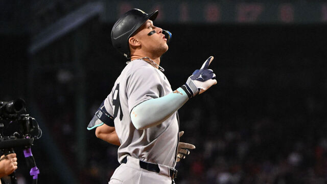 BOSTON, MASSACHUSETTS - SEPTEMBER 12: Aaron Judge #99 of the New York Yankees reacts after hitting a solo home run against the Boston Red Sox during the first inning at Fenway Park on September 12, 2025 in Boston, Massachusetts.