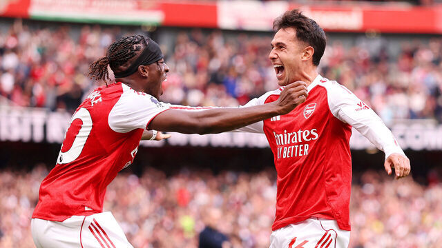 LONDON, ENGLAND - SEPTEMBER 13: Martin Zubimendi celebrates scoring his team's first goal with teammate Noni Madueke of Arsenal during the Premier League match between Arsenal and Nottingham Forest at Emirates Stadium on September 13, 2025 in London, England.