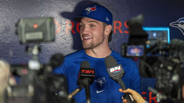 TORONTO, CANADA - AUGUST 9: Toronto Blue Jays draft pick Trey Yesavage gives an interview before an MLB game against the Oakland Athletics at Rogers Centre on August 9, 2024 in Toronto, Canada.