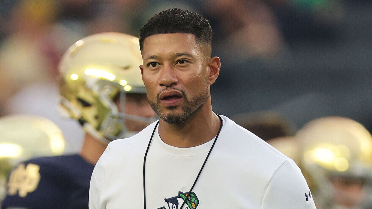 SOUTH BEND, INDIANA - SEPTEMBER 13: Head coach Marcus Freeman of the Notre Dame Fighting Irish looks on prior to the game against the Texas A&M Aggies at Notre Dame Stadium on September 13, 2025 in South Bend, Indiana.