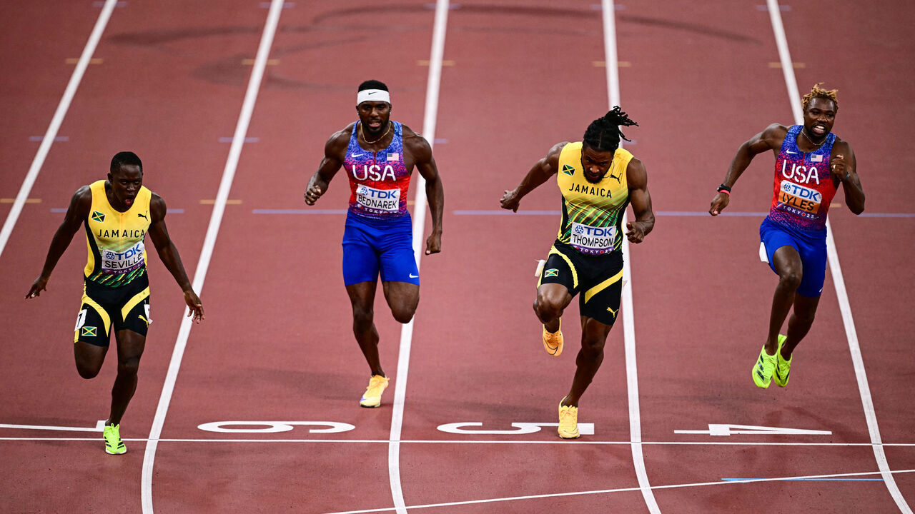 (From L) Jamaica's Oblique Seville, US' athlete Kenneth Bednarek, Jamaica's athlete Kishane Thompson and US sprinter Noah Lyles cross the finish line in the men's 100m final during the World Athletics Championships in Tokyo on September 14, 2025.