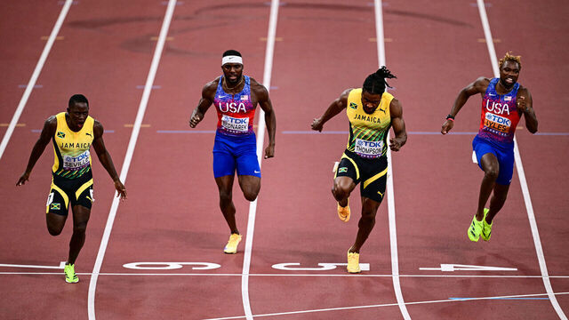 (From L) Jamaica's Oblique Seville, US' athlete Kenneth Bednarek, Jamaica's athlete Kishane Thompson and US sprinter Noah Lyles cross the finish line in the men's 100m final during the World Athletics Championships in Tokyo on September 14, 2025.