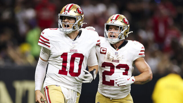 NEW ORLEANS, LOUISIANA - SEPTEMBER 14: Mac Jones #10 of the San Francisco 49ers celebrates a touchdown with Christian McCaffrey #23 in the second half during an NFL football game against the New Orleans Saints at Caesars Superdome on September 14, 2025 in New Orleans, Louisiana.