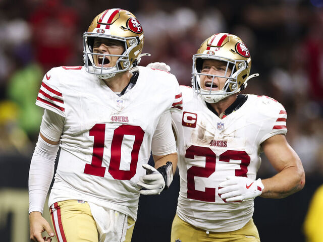 NEW ORLEANS, LOUISIANA - SEPTEMBER 14: Mac Jones #10 of the San Francisco 49ers celebrates a touchdown with Christian McCaffrey #23 in the second half during an NFL football game against the New Orleans Saints at Caesars Superdome on September 14, 2025 in New Orleans, Louisiana.