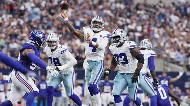ARLINGTON, TEXAS - SEPTEMBER 14: Dak Prescott #4 of the Dallas Cowboys makes a pass in the first half of the game against the New York Giants at AT&T Stadium on September 14, 2025 in Arlington, Texas.