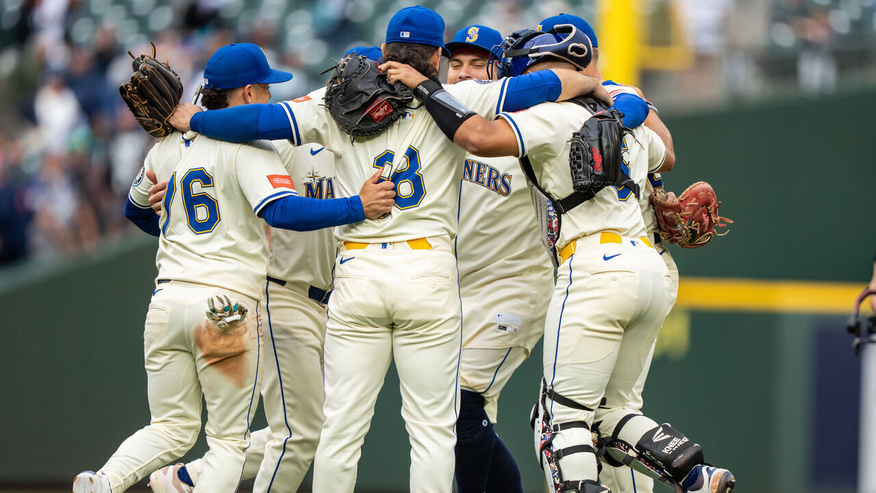 SEATTLE, WA - September 14: Seattle Mariners (L-R) Leo Rivas #76, Eugenio Suarez #28, Josh Naylor #12 and Harry Ford #5 at T-Mobile Park on September 14, 2025 in Seattle, Washington. The Mariners won 11-2.