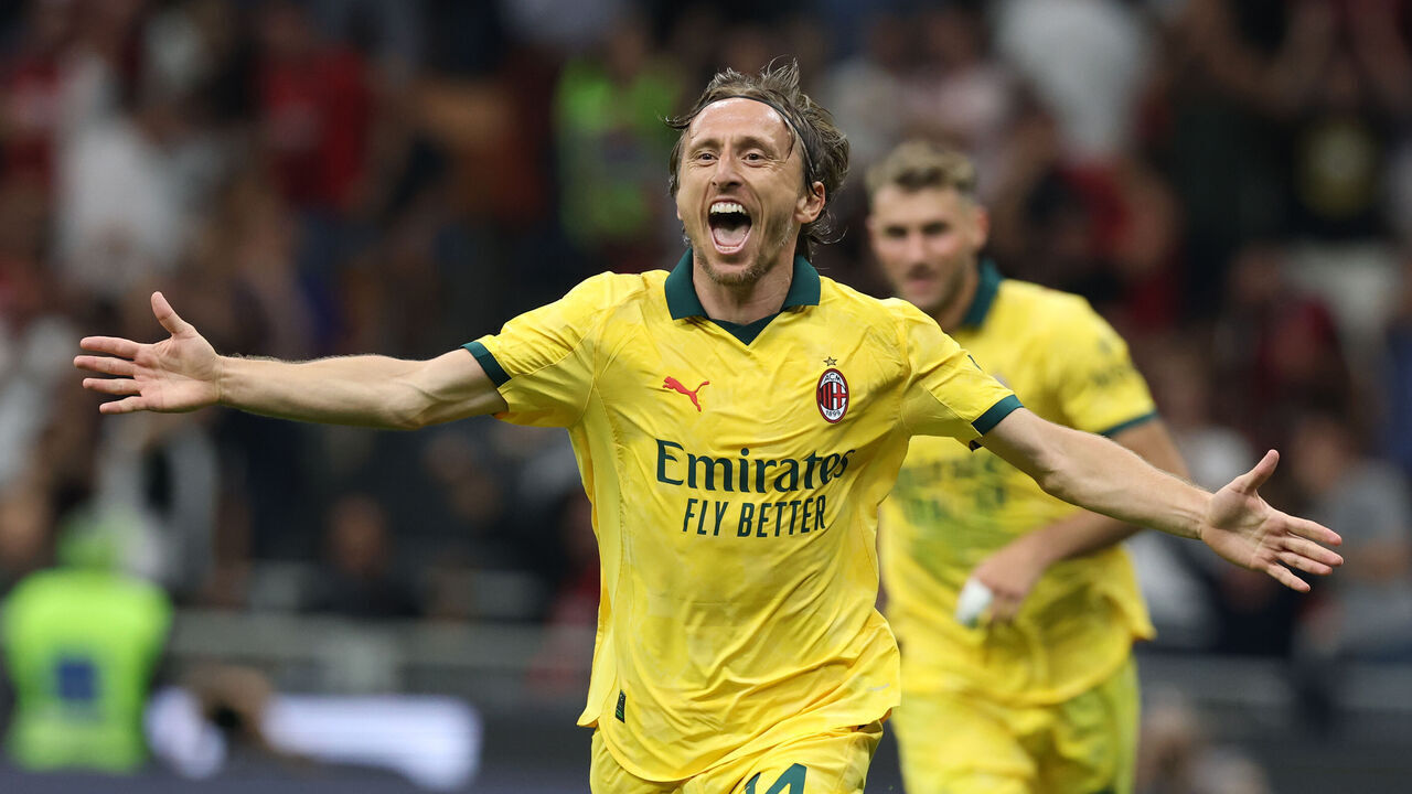 MILAN, ITALY - SEPTEMBER 14: Luka Modric of AC Milan celebrates after scoring the opening goal during the Serie A match between AC Milan and Bologna FC 1909 at Giuseppe Meazza Stadium on September 14, 2025 in Milan, Italy.