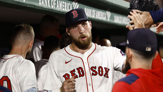 BOSTON, MA - SEPTEMBER 14: Pitcher Garrett Crochet #35 of the Boston Red Sox is congratulated in the dugout after the sixth inning against the New York Yankees at Fenway Park on September 14, 2025 in Boston, Massachusetts.