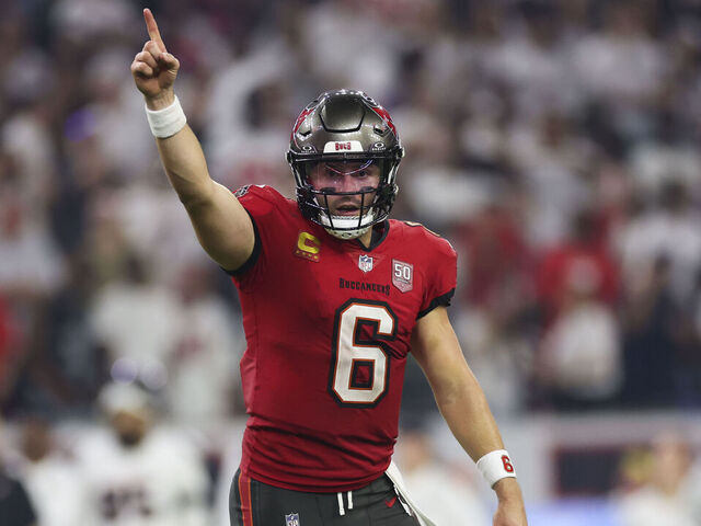HOUSTON, TEXAS - SEPTEMBER 15: Baker Mayfield #6 of the Tampa Bay Buccaneers celebrates a touchdown during the second half of an NFL football game against Houston Texans at NRG Stadium on September 15, 2025 in Houston, Texas.