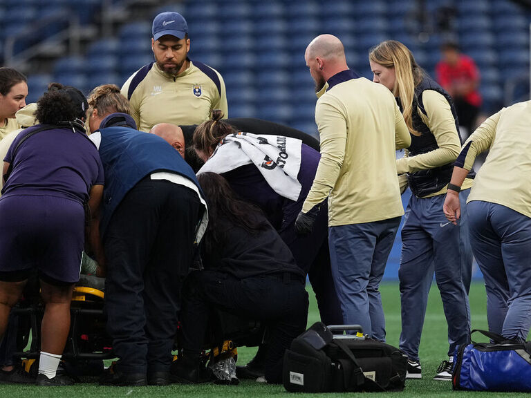 Racing Louisville's DeMelo remains hospitalized after collapsing during ...