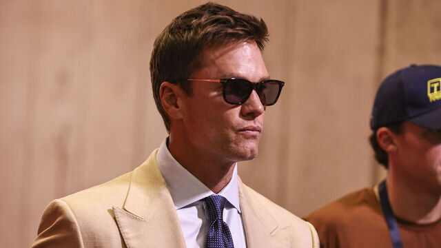 KANSAS CITY, MO - SEPTEMBER 14: Fox Sports analyst Tom Brady arrives at the stadium before an NFL game between the Philadelphia Eagles and Kansas City Chiefs on September 14, 2025 at GEHA Field at Arrowhead Stadium in Kansas City, MO.