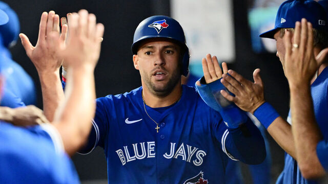 TAMPA, FLORIDA - SEPTEMBER 16: George Springer #4 of the Toronto Blue Jays celebrates with teammates in the dugout after scoring in the first inning against the Tampa Bay Rays at George M. Steinbrenner Field on September 16, 2025 in Tampa, Florida.