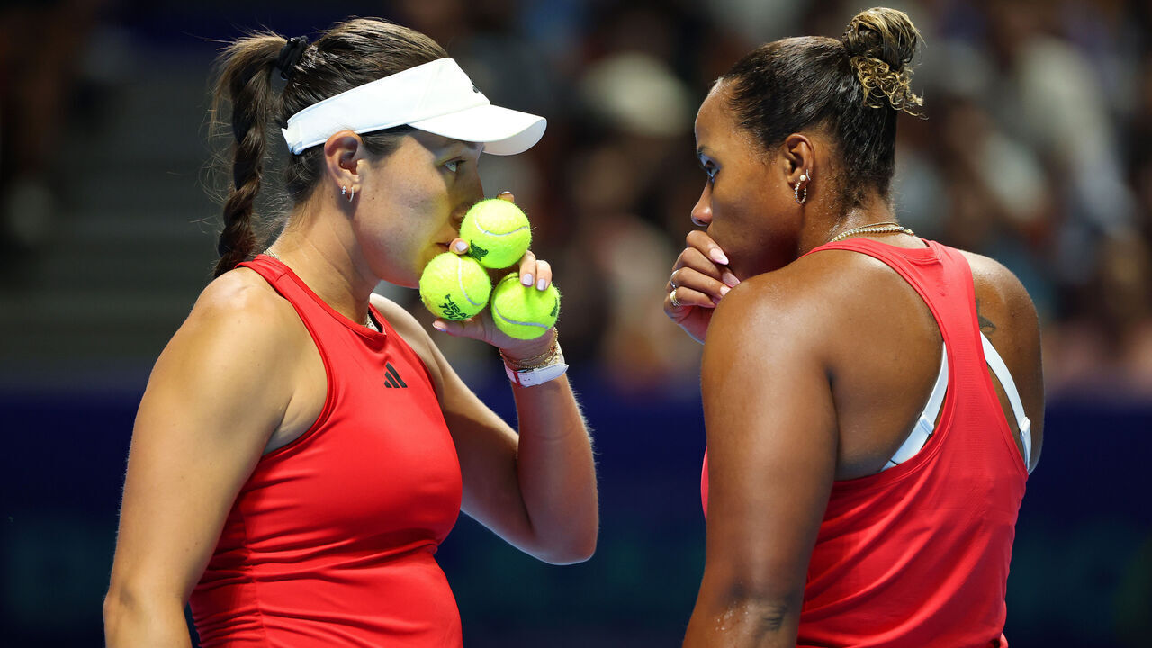 SHENZHEN, CHINA - SEPTEMBER 18: Jessica Pegula and Taylor Townsend of United States talk team tactics during match 3 against Elena Rybakina and Yulia Putintseva of Kazakhstan in the Billie Jean King Cup by Gainbridge Finals 2025, Quarter-Final match between Kazakhstan and USA at Shenzhen Bay Sports Centre Arena on September 18, 2025 in Shenzhen, China.
