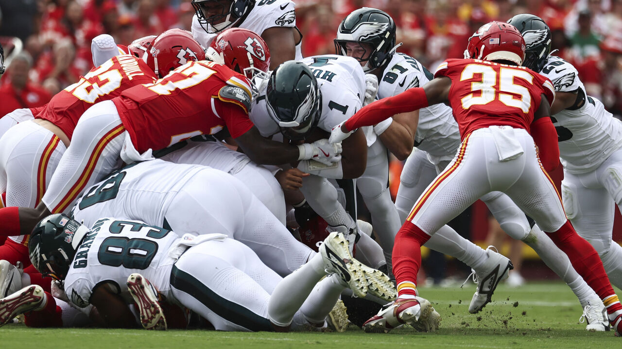 KANSAS CITY, MO - SEPTEMBER 14: Philadelphia Eagles quarterback Jalen Hurts (1) converts a "tush push" play for a first down in the first quarter of an NFL game between the Philadelphia Eagles and Kansas City Chiefs on September 14, 2025 at GEHA Field at Arrowhead Stadium in Kansas City, MO.