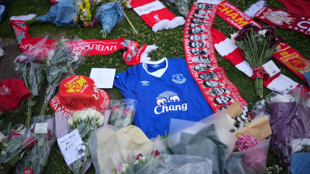 LIVERPOOL, ENGLAND - JULY 04: An Everton shirt is seen amongst tributes laid for Diogo Jota at Anfield on July 04, 2025 in Liverpool, England. The current Liverpool player and Portugal international Diogo Jota, 28, was killed in a car crash yesterday in Zamora, Spain. He was travelling in a Lamborghini with his brother, returning to the UK for the start of the Premier League season, when the car crashed after a tyre blowout while overtaking a car. Jota leaves behind his wife of two weeks, Rute, and their three young children.