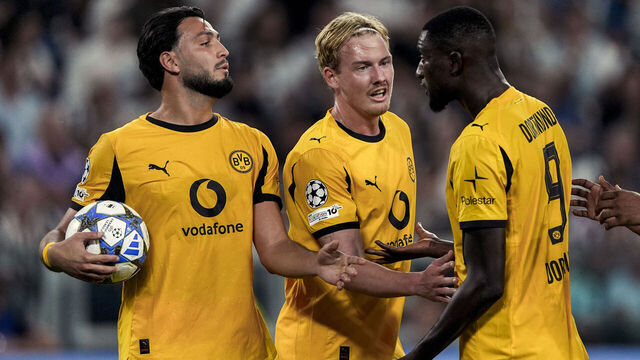 TURIN, ITALY - SEPTEMBER 16: (L-R) Ramy Bensebaini of Borussia Dortmund, Julian Brandt of Borussia Dortmund and Serhou Guirassy of Borussia Dortmund react during the UEFA Champions League 2025/26 group stage matchday 1 between Juventus FC and Borussia Dortmund at Juventus Stadium on September 16, 2025 in Turin, Italy.