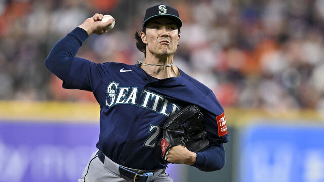HOUSTON, TEXAS - SEPTEMBER 19: Bryan Woo #22 of the Seattle Mariners throws a pitch in the first inning against the Houston Astros at Daikin Park on September 19, 2025 in Houston, Texas.