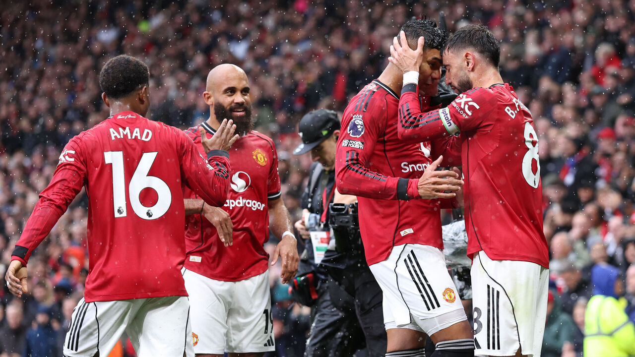 MANCHESTER, ENGLAND - SEPTEMBER 20: Bruno Fernandes and Casemiro of Manchester United celebrate the opening goal during the Premier League match between Manchester United and Chelsea at Old Trafford on September 20, 2025 in Manchester, England.