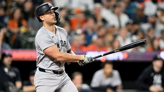 BALTIMORE, MARYLAND - SEPTEMBER 20: Giancarlo Stanton #27 of the New York Yankees hits a three-run home run in the first inning against the Baltimore Orioles at Oriole Park at Camden Yards on September 20, 2025 in Baltimore, Maryland.