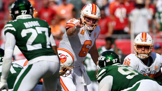 TAMPA, FLORIDA - SEPTEMBER 21: Baker Mayfield #6 of the Tampa Bay Buccaneers points to Malachi Moore #27 of the New York Jets during the fourth quarter at Raymond James Stadium on September 21, 2025 in Tampa, Florida.