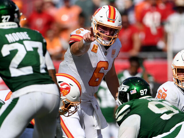 TAMPA, FLORIDA - SEPTEMBER 21: Baker Mayfield #6 of the Tampa Bay Buccaneers points to Malachi Moore #27 of the New York Jets during the fourth quarter at Raymond James Stadium on September 21, 2025 in Tampa, Florida.
