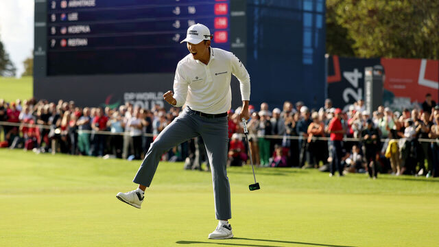 PARIS, FRANCE - SEPTEMBER 21: Michael Kim of the United States celebrates holing a par putt on the 18th green to set the clubhouse lead on day four of the FedEx Open de France 2025 at Golf de Saint-Nom-la-Breteche on September 21, 2025 in Paris, France.